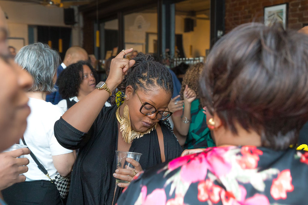 A guest fully absorbed in the music — eyes closed, lost in the moment