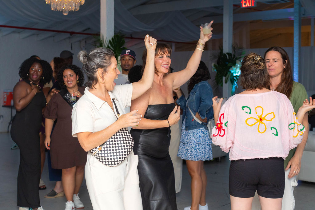 The 30-year-old honoree with friends — big smiles, full energy