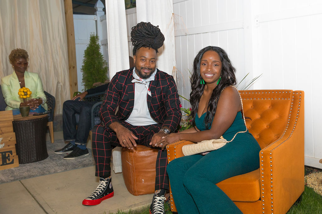 Couple seated together in the outdoor lounge