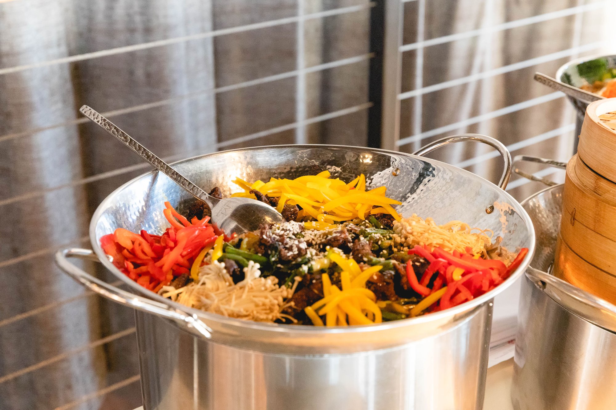 Slider station — trays of mini burgers on tiered silver display
